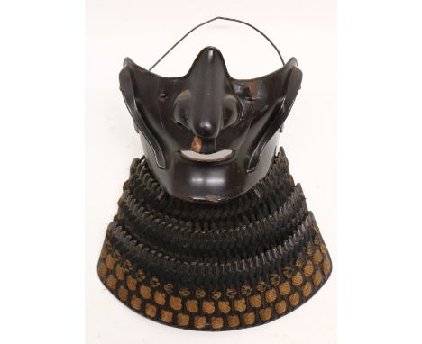 Japanese black lacquered Samurai armour menpo lower face mask, with three-section layered yodarekake, red lacquered interior,