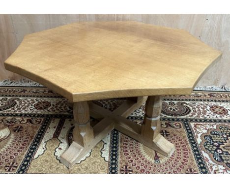 Robert Mouseman Thompson of Kilburn - an oak octagonal coffee table, adzed top on four octagonal baluster and block supports 