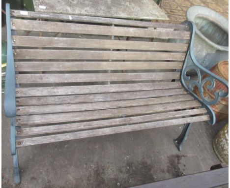 Victorian style garden bench, wood slat back and seat on fleur-de-lis cast end supports, W126cm D65cm H77cmPOA  https://www.b