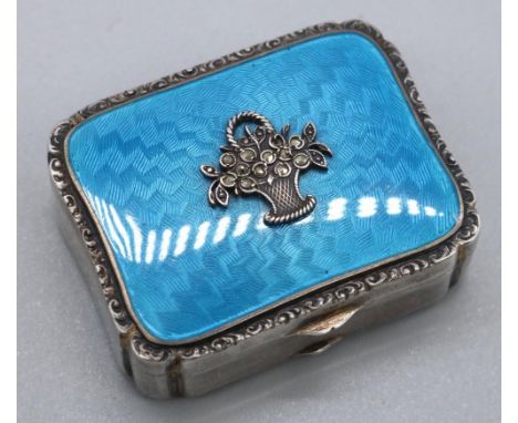 Late 19th century continental silver shaped rectangular patch box, hinged blue guilloche enamel lid with marcasite flower bas