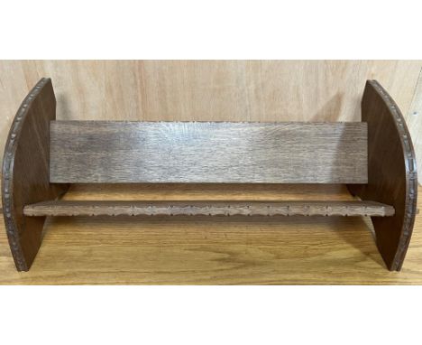 Alan Acornman Grainger, Acorn Industries Brandsby - an oak book trough, pegged shelf and back on curved supports with chip ca