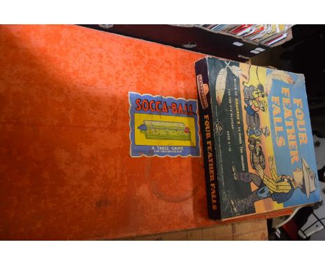 A pair of vintage 1930s table/board games in original boxes, to include: - Four Feather Falls, by Bell - Socca-Ball by Chad V