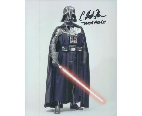 Star Wars Darth Vadar body double C Andrew Nelson signed full length 10 x 8 colour photo with light sabre in hand menacing. G