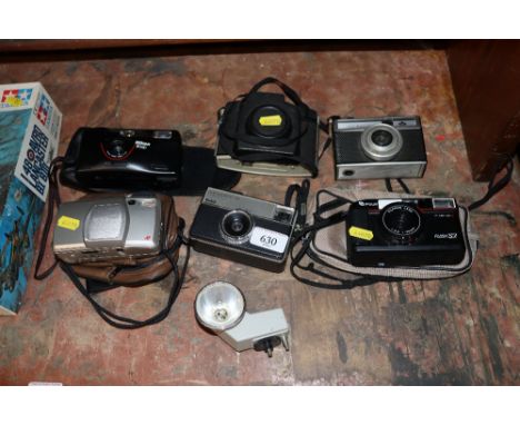 A collection of vintage and modern cameras 