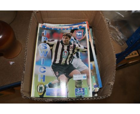 A box of Ipswich Town programmes and ticket stubs