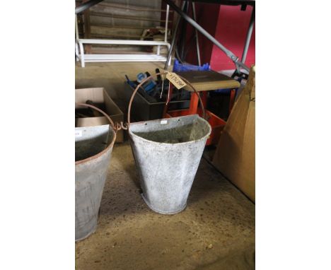 A galvanised wall mounting planter with swing handle(109)