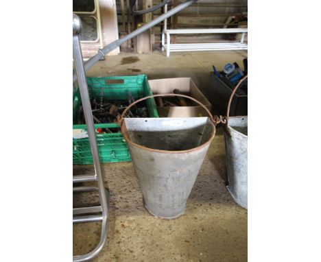 A galvanised wall mounting planter with swing handle(108)