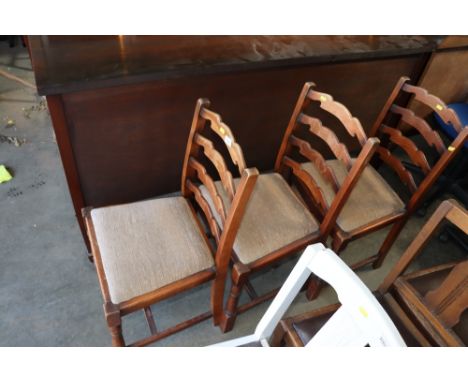 Three ladder back chairs