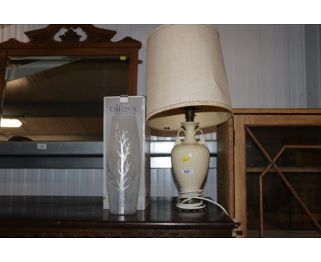 A table lamp and shade together with a frosted glass vase