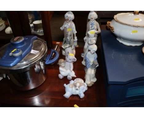 A quantity of Lladro style and Nao figures 
