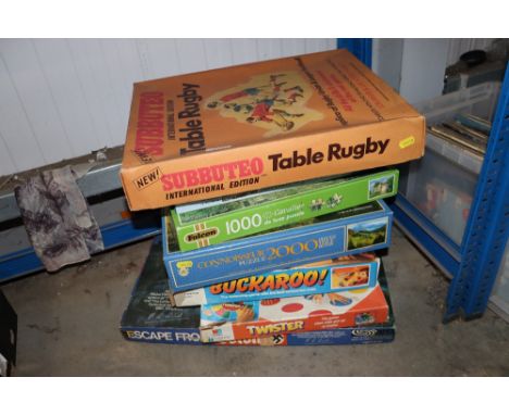 A collection of games, puzzles and Subbuteo International edition table rugby