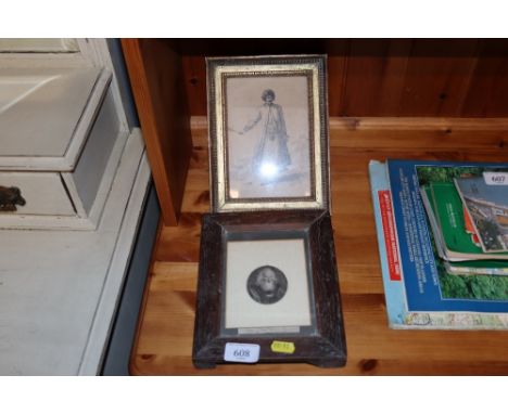 An oak framed black and white portrait and a gilt framed black and white print figure