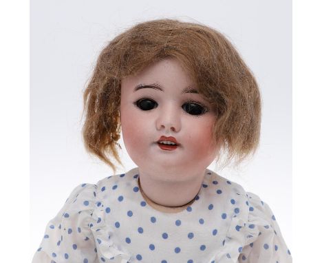 Including Mould No 60, with weighted brown eyes, open mouth and composition body (marked SFBJ, 60, Paris, 18ins 46cms high). 