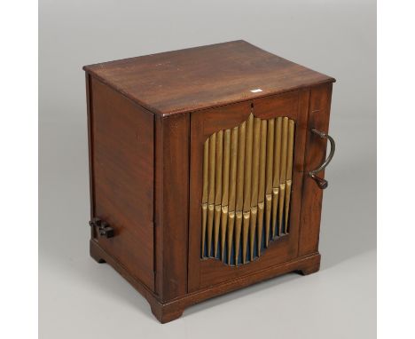 An interesting 19thc mahogany barrel organ, with a large cylinder operated by a hand crack handle at the front, and with vari