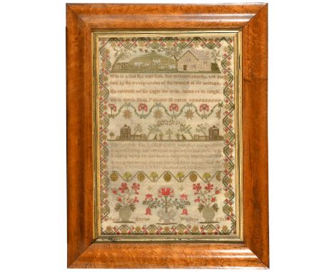 A large sampler embroidered with a variety of houses and animals within a landscape, with religious proses and further border