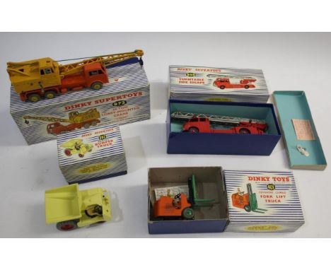 4 boxed items, 956 Turntable Fire Escape, 972 20 Ton Lorry Mounted Crane Coles, 401 Fork Lift Truck and 962 Dumper Truck. (4)