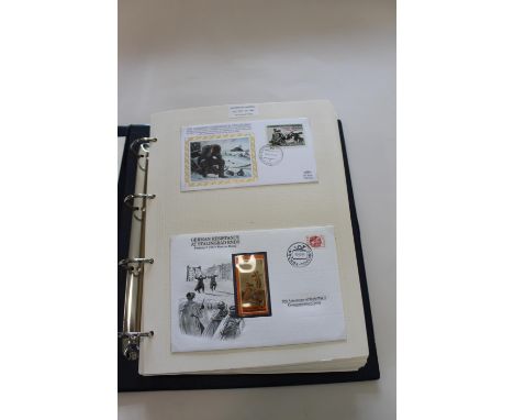 Four Stanley Gibbons albums, with various first day covers and stamps relating to WWII. Including  Battle of Alamein, Savo Is