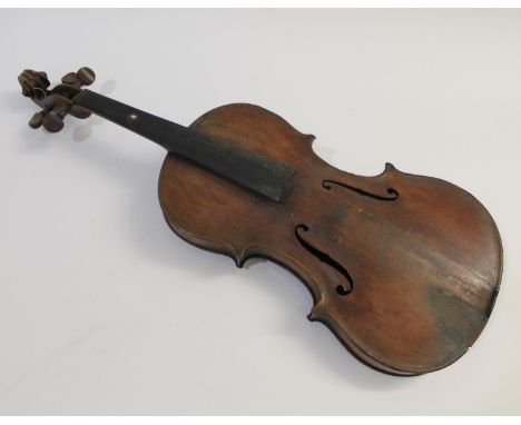 An antique full length dark stained violin with a two piece back, in a fitted walnut case with a label for 'J Vickers & Sons 