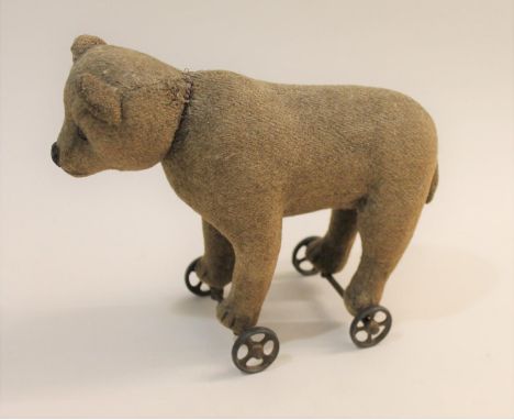 Possibly by Steiff,  the small Bear with black boot button eyes and stitched nose and mouth, the standing Bear mounted on met