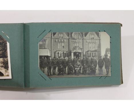 A small album with various Great Britain cards, St Ives, Bear Family Hotel (Military), Fishing Fleet Falmouth, Fowey, Bodenic