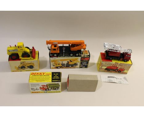 4 boxed models including 980 Coles Hydra Truck (orange body), 976 Tractor Dozer, 451 Johnston Road Sweeper (orange cab, metal
