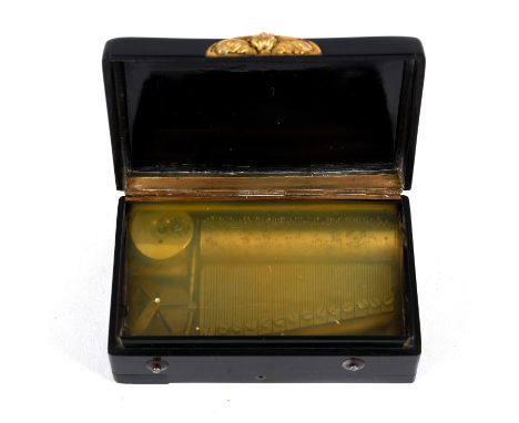 A small early 19thc cylinder musical box, with two small levers on the front of a black case with brass catch. The cylinder 6
