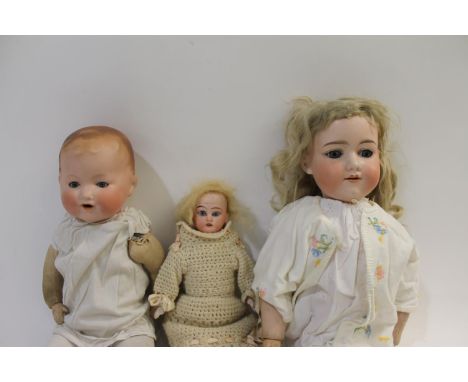 Including a Armand Marseille 390 doll, with weighted blue eyes and open mouth, stamped 'Armand Marseille, 390, 7 1/2', 21ins 
