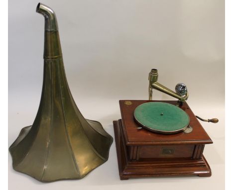 A Model 23 gramophone with a wind mechanism and handle, with a brass horn and a HMV No 5b sound box. In working order, horn 4
