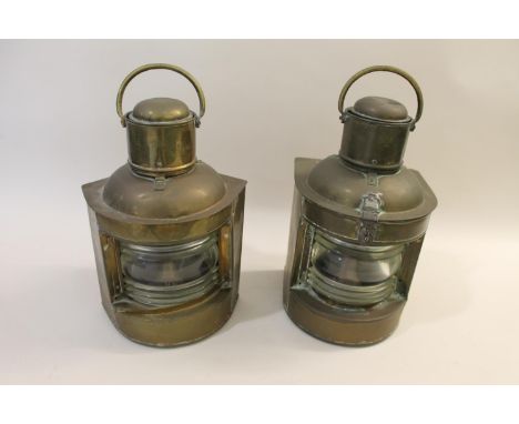Two similar brass ships lanterns, both with convex glass. Both unmarked, 36cms and 35cms high.  *CR:  Glass on both seems gen