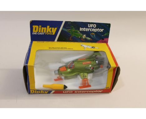 Various boxed models including 351 UFO Interceptor (with missile), 668 Foden Army Truck, 683 Chieftain Tank, 266 ERF Fire Ten