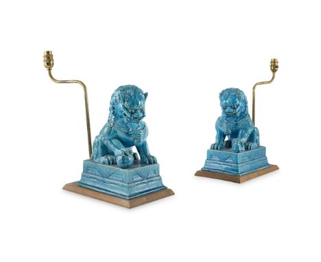 PAIR OF TURQUOISE GLAZED BUDDHIST LIONS CONVERTED INTO LAMPSQING DYNASTY, 19TH CENTURY each lion modelled seated on a rectang