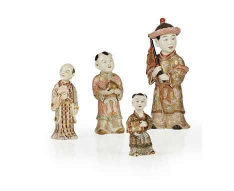 COLLECTION OF FOUR SATSUMA FIGURESSTYLE OF CHIN JUKAN, MEIJI PERIOD the first a boy dressed in Korean robes and holding a ban