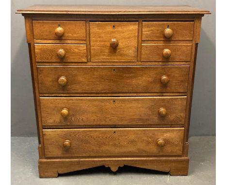 Late Victorian pale oak Scotch straight front chest of drawers, the moulded cornice above central hat drawer, flanked by one 