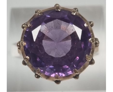 14ct gold large amethyst facetted ring in claw setting.  5.4g approx.  Size M1/2.  (B.P. 21% + VAT) 