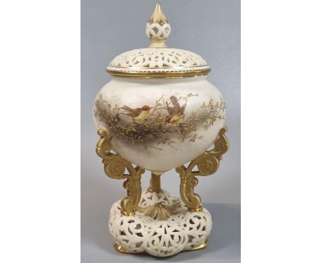 Royal China Works Worcester porcelain potpourri jar and cover, raised on three scrolled supports above a pierced base, hand p