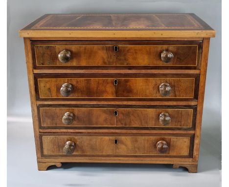 19th century mahogany inlaid straight front apprentice chest of four long drawers with herringbone inlay, raised on bracket f