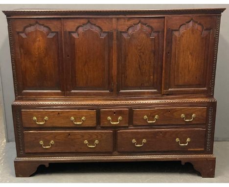 18th century Welsh Cardiganshire oak two stage coffer or mule chest now converted to a cupboard, the moulded top above four o