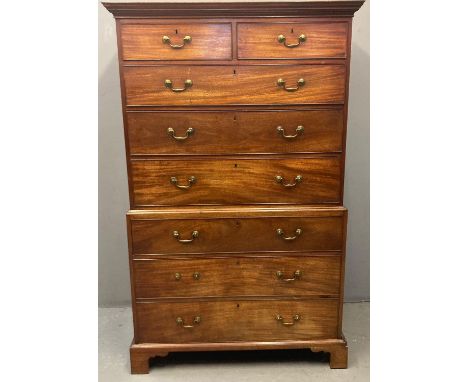 George III mahogany chest on chest, the moulded cornice above an arrangement of two short and three long cock beaded drawers,