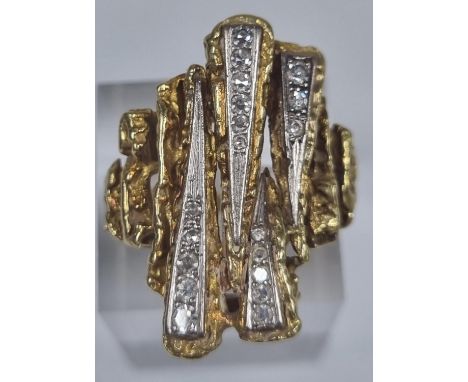 Yellow metal modernist bark finish and diamond ring, set with four tapering rows of diamonds.  13.7g approx.  Size R.  (B.P. 