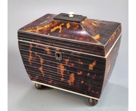 Late 18th/early 19th Century sarcophagus shaped and fluted design tortoiseshell twin tea caddy on ball feet. 15x10x13cm appro