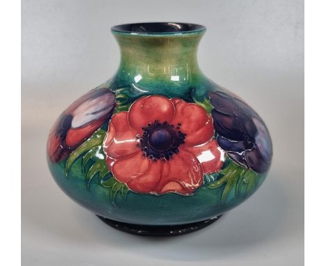 Mid century Moorcroft Pottery tube lined 'Anemone' globular squat vase. 13cm high approx. Signed to the underside 'W Moorcrof