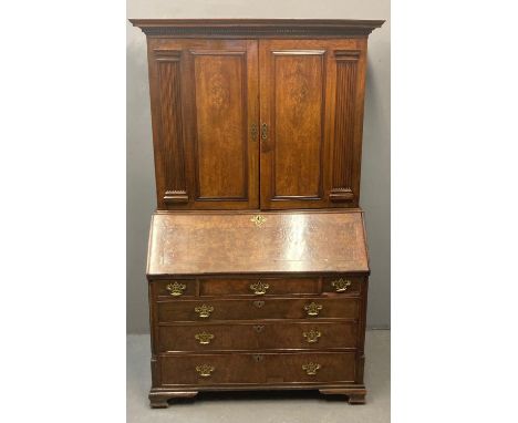 18th century pollard oak and burr walnut two stage bureau bookcase, the moulded and dental cornice above two blind panelled d