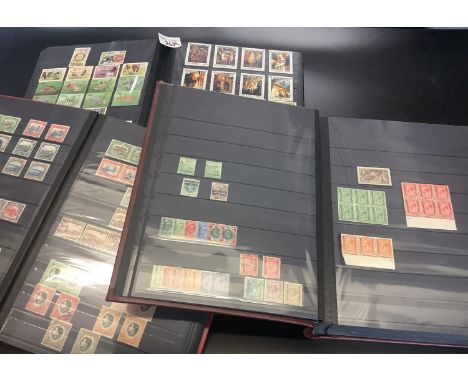 Collection of African stamps in six large and three small stockbooks. countries include: South Africa, South West Africa, KUT