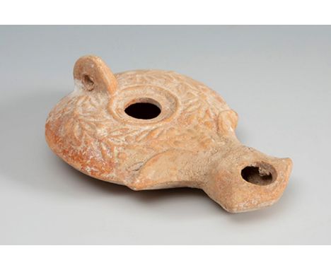 Roman Lucerne, 2nd-3rd century AD.Terracotta.Provenance: Private collection, Bordeaux, France.Repaired beak.Measurements: 13 