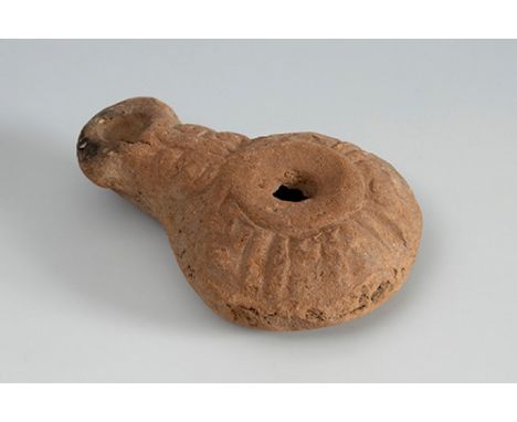 Egyptian Lucerne. Egyptian culture, 2nd-1st century BC.Terracotta.Provenance. Private collection, Bordeaux, France.Measuremen