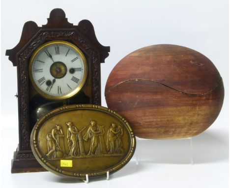 Continental mantel clock brass plaque moulded with muses and a ceramic egg container. No conditions reports for this sale.