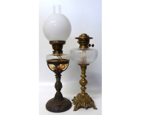 Victorian Oil Lamp with cast iron base and one other with brass base No conditions reports for this sale.