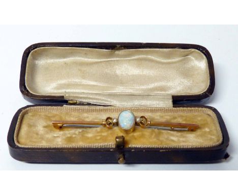 Opal single stone 9ct gold bar brooch. No conditions reports for this sale.