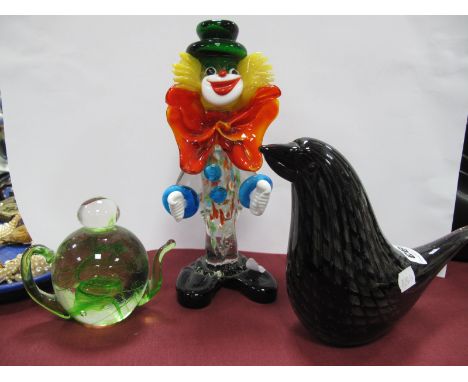 A Murano Style Glass Mottled Black Glass Bird, a Selkirk glass novelty teapot and a coloured glass clown. (3)