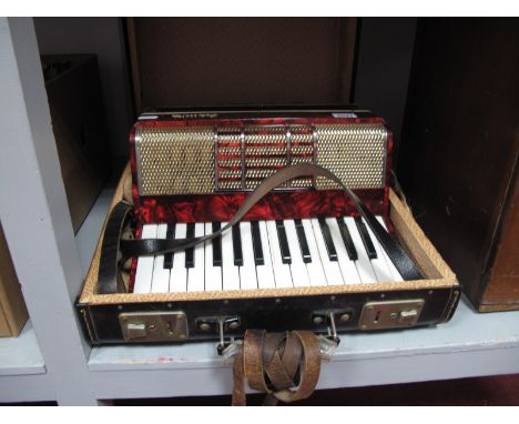 A Golotta Piano Accordion, 26 key, 32 button, cased.